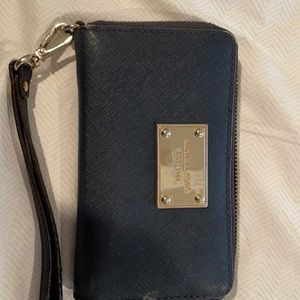 Michael Kors-set of two wristlets. One blue One Black.  Good condition.